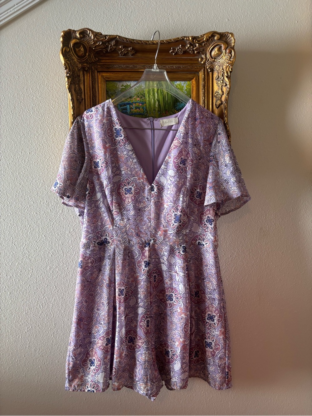 Altar'd State Lavender Paisley V‑Neck Romper with Flutter Sleeves